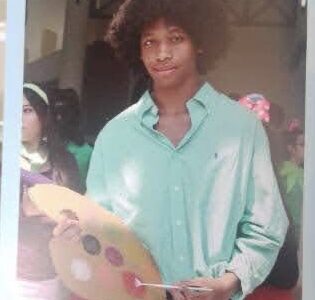 Jamar Thomas, junior, dressed as Bob Ross during his senior year of high school. Photo Courtesy of Jamar Thomas.