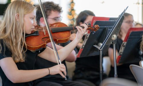 Alaina Wisteria, first-year, plays her violin in the Ripon College Holiday concert. Photo Courtesy of Ric Damm.